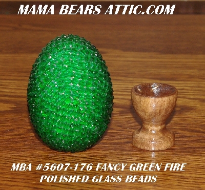 +MBA #5607-176  "Green Fire Polished Glass Bead With Stand"