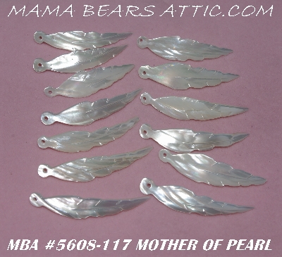 +MBA #5608-117   "Set Of 13 Hand Cut & Carved Mother Of Pearl Feathers"