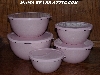 MBA #Pink19-0028   "2006 Set Of 5 Pink & White Enameled Storage Bowls With Plastic Lids"