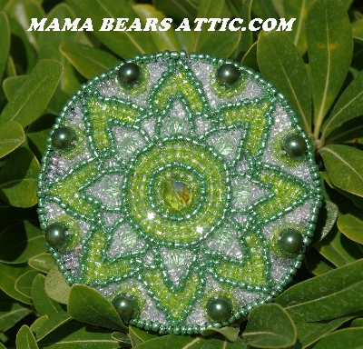 MBA #5614-100  "Metallic Green & Clear Luster Glass Bead Round Brooch"