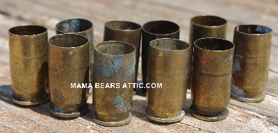 MBA #5627B-2093  "Vintage 1964 .45 Cal Set Of (10) WCC 64 Brass Spent Shell Casings"
