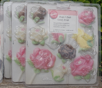 MBA #5627B-2213  "1990's Set Of 5 Wilton Candy Molds"