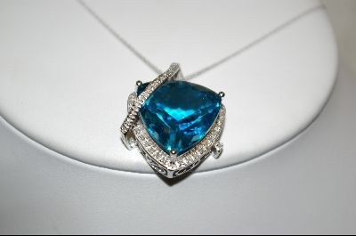 +18K White Gold Fancy Trillion Cut Blue Topaz & Diamond Pendant