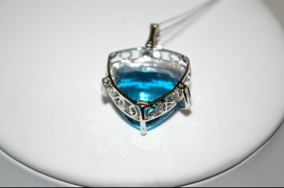 +18K White Gold Fancy Trillion Cut Blue Topaz & Diamond Pendant