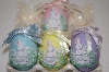 +MBA #12-005  1990's Set Of 4 Hand Carved Ceramic Bunny Eggs