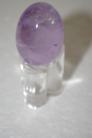 +MBA #12-229  Clear Amethyst Hand Cut & Polished Egg