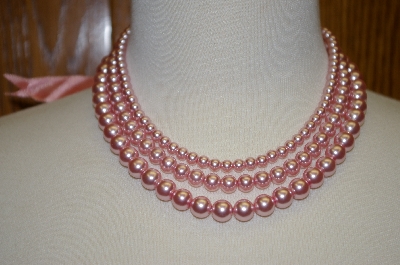+ Triple Strand Pink Glass Pearl Necklace