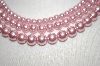 + Triple Strand Pink Glass Pearl Necklace