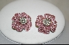 +  Pair Of Clip On Pink Crystal Flower Earrings