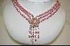 +  "2004  Majestic Simulated Pink  Pearl Three Strand Necklace