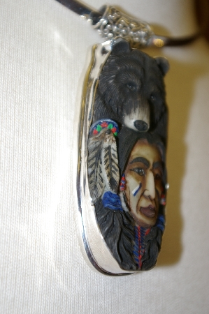 +MBA #16-351  Hand Carved & Painted Indian & Bear Pendant
