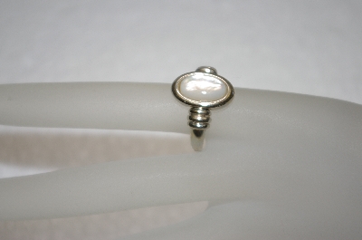 +MBA #16-133  Artist Stamped Mother Of Pearl Sterling Ring