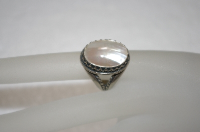 +MBA #16-128  Fancy Artist Stamped Mother Of Pearl Sterling Ring