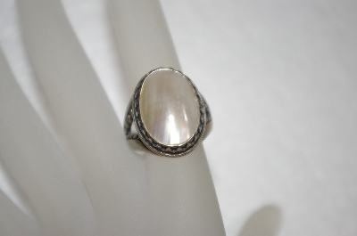 +MBA #16-128  Fancy Artist Stamped Mother Of Pearl Sterling Ring