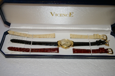 +MBA #17-153   Vicence Medium Round Case 14K Watch With 6 Leather Straps