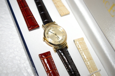 +MBA #17-153   Vicence Medium Round Case 14K Watch With 6 Leather Straps