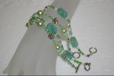 +  Set Of 4 Green Beaded Bracelets