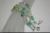 +  Set Of 4 Green Beaded Bracelets