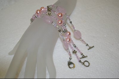 +  Set of 4 Pink Glass Bead Bracelets