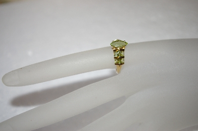 +MBA #17-163  14K Marquise & Princess Cut Peridot Ring