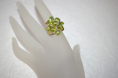 +MBA #17-263  9 Stone Oval Cut Peridot 14K Ring