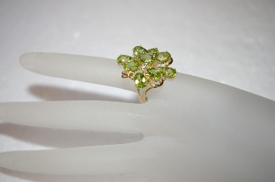 +MBA #17-263  9 Stone Oval Cut Peridot 14K Ring