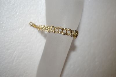 +MBA #17-138  14K Yellow Gold Triple Link Charm Bracelet