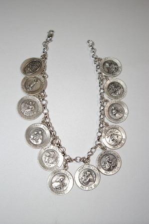 +MBA #18-166  Sterling Twelve Saint Charm Bracelet