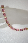 +MBA #18-141  Elegant Pink CZ Cushion Cut Gold Plated Bracelet