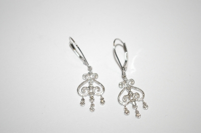 +MBA #19-614  10K White Gold Diamond Scroll Earrings