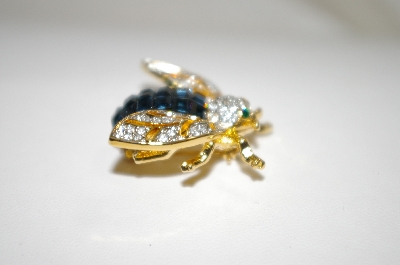 +MBA #19-434  Gold Plated Blue & Clear Crystal Bee Pin