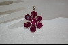 +MBA #RR   7 Stone Over Cut Ruby Flower Pendant