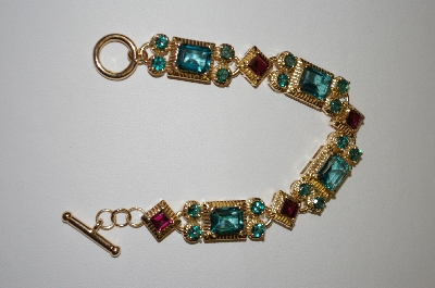 +MBA #21-553  14K Gold Vermeil 7" Green Topaz & Garnet Bracelet