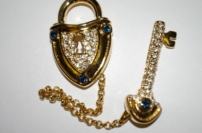 +MBA #21-272  Nolan Miller Lock & Key Pin