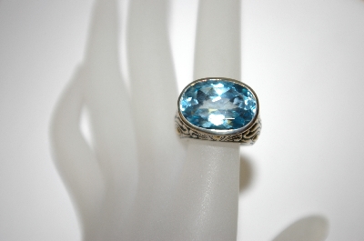 +MBA #21-128  Sterling/18K Blue Topaz Ring