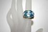 +MBA #21-128  Sterling/18K Blue Topaz Ring