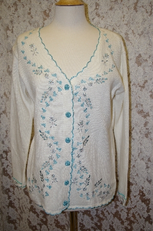 +MBA #16-022   "Limited Edition White Embroidered Storybook Sweater