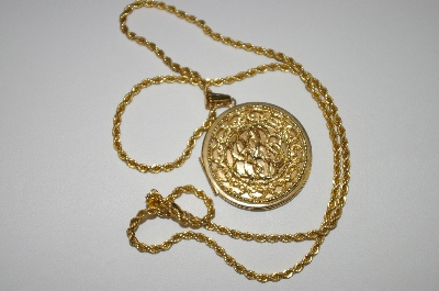 +MBA #25-278  "Made In Korea Gold Plated Round Locket