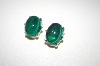 +MBA #S4-319  Gold Plated Green Glass Cabachon Clip Style Earrings