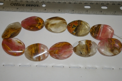+MBA #23-043    16" Strand Of Fancy Cut Oval Agate