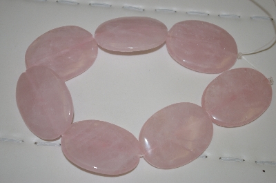 +MBA #23-016     16" Strand Of Large Oval Cut Rose Quartz Beads