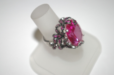 +MBA #23-584  Charles Winston Large Oval Created Pink Sapphire Ring