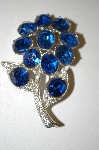 +MBA #25-767  Coro Rhodium Plated Blue Rhinestone Flower Pin
