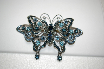 +  Blue Crystal Butterfly Pendant