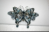 +  Blue Crystal Butterfly Pendant