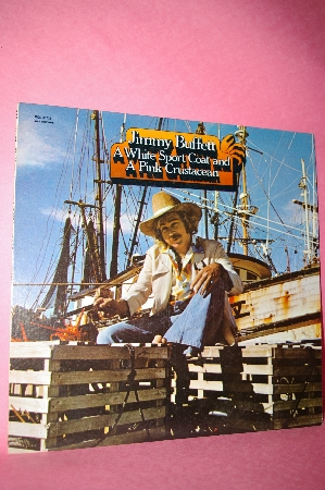 1973 "Jimmy Buffett" A White Sport Coat & A Pink Crustacean"