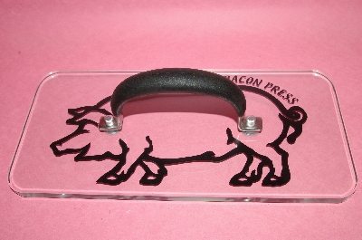 +MBA #54-026  "Prepology Glass Pig Bacon Press"