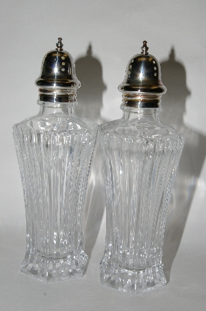 +MBA #65-068   "Pair Of "Symmetry" Clear Glass Salt & Pepper Shakers With Sterling Tops