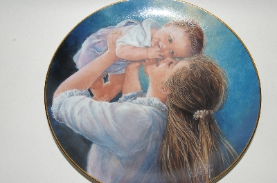 +MBA #69-076   "1988 Sue Etem "Bundles Of Joy" Collectors Plate With Oak & Glass Plate Frame