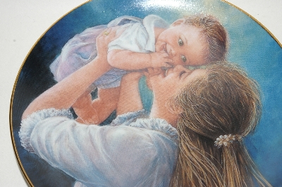+MBA #69-076   "1988 Sue Etem "Bundles Of Joy" Collectors Plate With Oak & Glass Plate Frame
